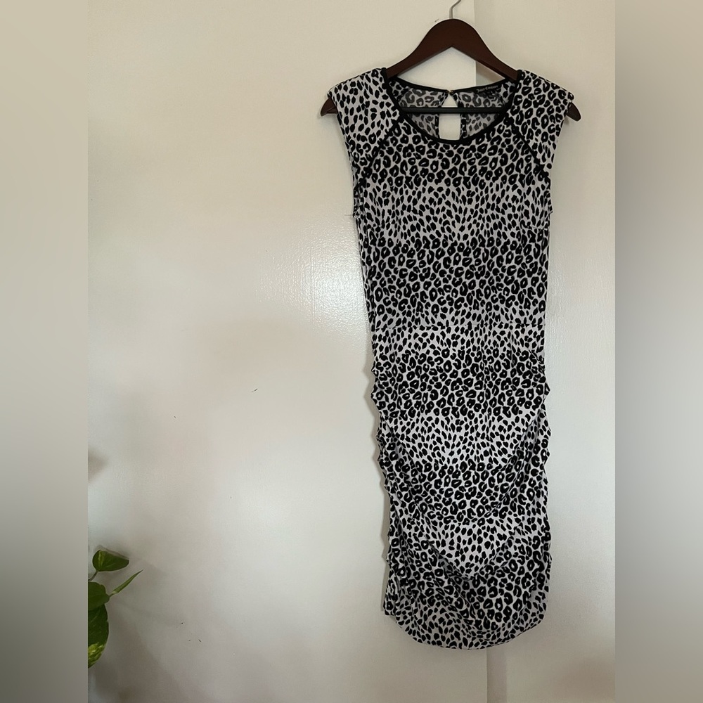 Juicy couture ruched adorable leopard print cutie. Keyhole back.